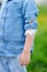 Close up photo of little boy with injured elbow with applied bandage