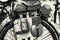 Close up photo of old military bicycle with equipment, black and