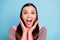 Close-up photo portrait of funny funky amazed lady holding her mouth opened isolated bright background