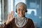 Close-up photo portrait of young beautiful Muslim business woman, tech support worker in hijab