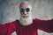 Close up photo of positive funky modern old man blogger make selfie enjoy x-mas festive celebration travel trip wear red