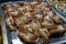 Close Up Photo of Raw Baby Geoduck Clams on a Silver Tray at a Street Food Barbecue Stall at a Night Market in Vietnam