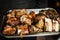 Close up photo of a tray full of traditional Argentine asado barbecue meat