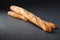 Close-up photo of two french baguettes on gray textural background