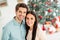 Close up photo of two people cheerful spouses feel romance enjoy christmas time x-mas holidays in house indoors