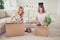 Close up photo two people mom and teen daughter with paper big boxes full ready change decor do repair wear white t