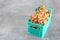 Close up photo of walnuts in miniature container, selective focus