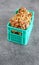 Close up photo of walnuts in miniature container, selective focus