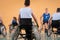 Close up photo of wheelchairs and handicapped war veterans playing basketball on the court