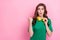 Close up photo worried lady wear trendy green clothes arm direct empty space disagree dislike prices isolated on pink