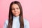 Close up photo of young pupil girl unhappy doubt looking empty space isolated on pastel pink color background