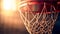 Close up photos of a basketball hoop, ring under stadium lights