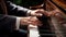 Close-up of a pianist\\\'s hands playing a grand piano