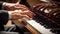 Close up of a pianist\\\'s hands playing a grand piano