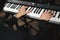 close-up of a pianist\'s hands while playing the piano