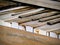 Close up of piano keys of an upright antique broken rustic piano outdoors in Arizona desert