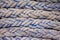 Close up picture of frayed boat ropes.