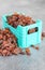Close up picture of organic raisins in miniature container, selective focus