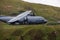 A close-up picture of an RAF Royal Air Force Lockheed C-130 Hercules transport plane carrying out low level flying in the United