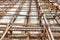 Close up picture of ribbed steel bar reinforcement construction frame ready for concrete casting, selective focus