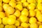 Close-up picture of yellow golf balls pile