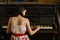 A close up picture of a young woman playing the piano