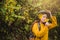 Close-up pictures of happy young women relaxing enjoying beauty Bua Tong yellow flower