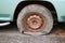 Close-up pictures of old cars, old wheels, steel, rusted tires, cracks, leaks, dangerous driving concepts