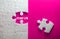 Close up piece of white jigsaw puzzle with JOIN US text , concept of a business challenge success completion with teamwork