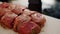 Close-up of pieces of raw meat on table in kitchen ready for home-made meal