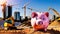 Close up of a piggy bank on sunny construction site. Savings deposits for the building phase