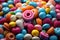 A close up of a pile of candy. Candy flat colorful background