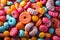 A close up of a pile of candy. Candy flat colorful background.