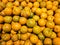 Close-up pile of Fresh oranges fruit (Sai Nam Phueng) or Tangerine orange in Thailand