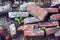 Close up pile of old rubble red bricks from the ruins of a demolished building.