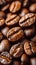 a close up of a pile of roasted coffee beans