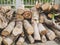 Close up from a pile of wood for fire in winter, ready for transport