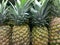 Close-Up Of Pineapples For Sale In Supermarket