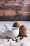 close-up, pinecones with nuts and mortar on a table on a wooden background