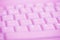 Close up of pink computer keyboard