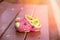 Close up pink and green Children`s Sandals shoes on the table