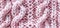 Close Up of a Pink Knitted Fabric. Generative AI