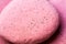 a close up of a pink object