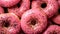 Close Up Of Pink Sprinkled Donuts: Bold Contrast And Photorealistic Detail