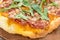 Close up of a Pizza Chorizo with rocket