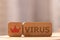 A close-up. A place for text. The concept of a coronavirus pandemic. Wooden cubes with coronavirus