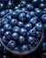 Close-up plastic glass with blueberries ready to take away. Quick, healthy snack from berries in convenient container