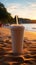 Close up plastic white coffee cup with black straw on sand of beach at sunset or sunrise sunlight