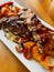 A close-up of a plate of churrasco pork steak