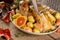 Close up of plate of thanksgiving roast turkey being carved and vegetables